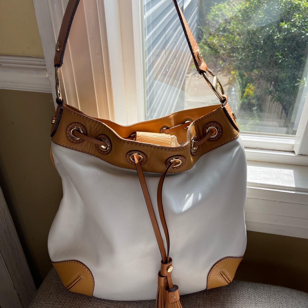 How to clean online michael kors leather bag