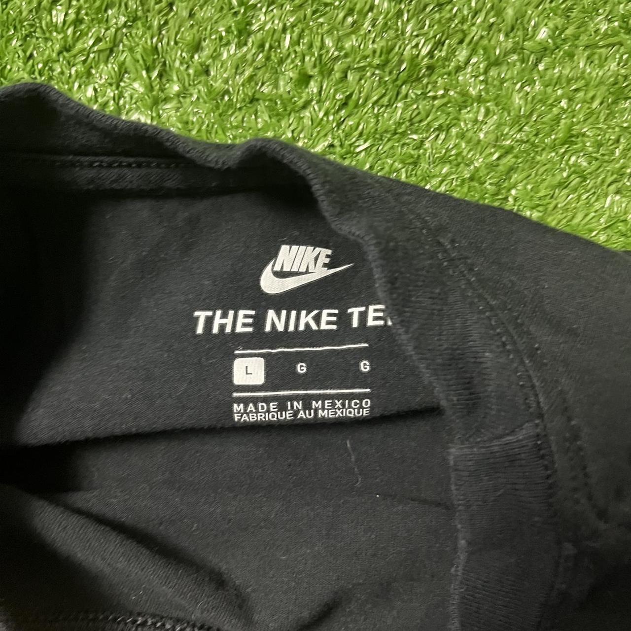 mens black and gold nike shirt