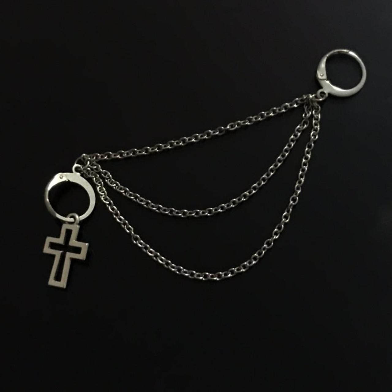 Multiple chain earring with cross