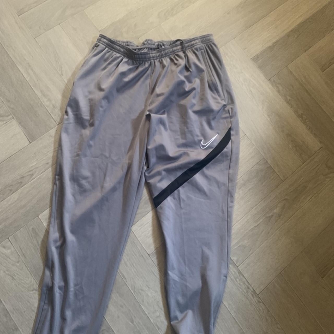 Men’s Nike trackie bottom size XL in grey and... - Depop