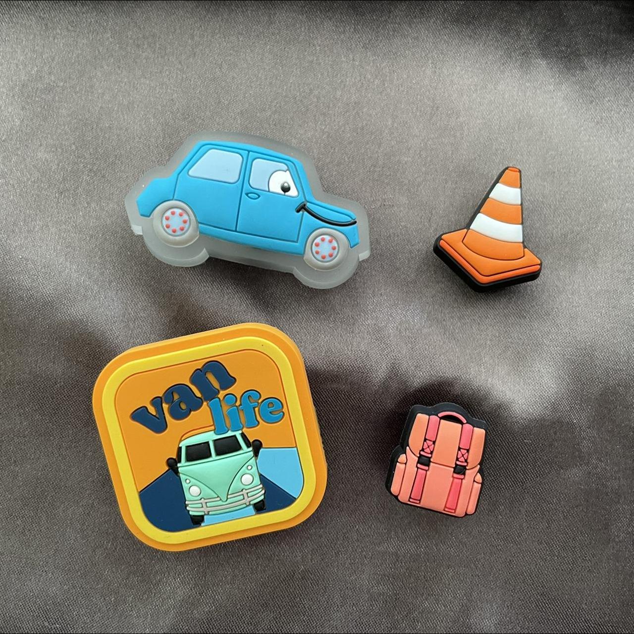 4 Jibbitz as shown Blue light up car Traffic... Depop