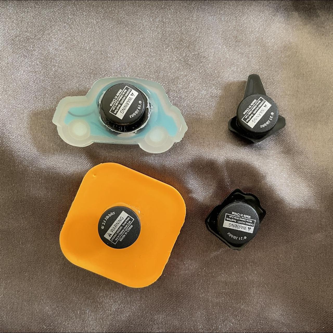 4 Jibbitz as shown Blue light up car Traffic... Depop