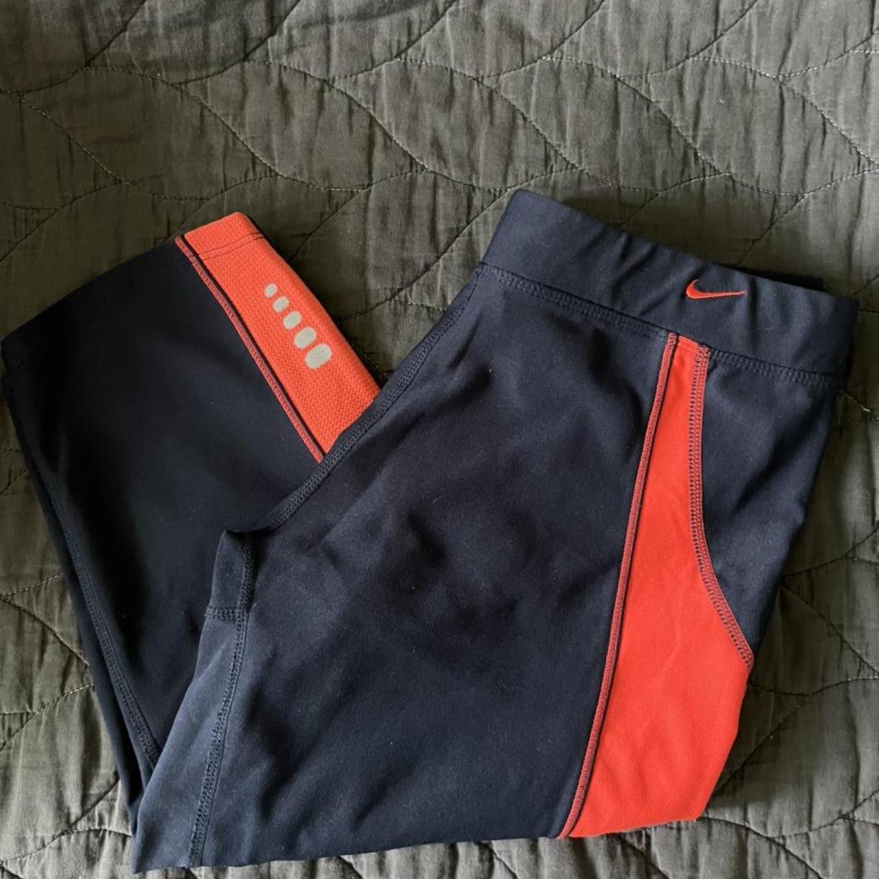 black and orange nike leggings