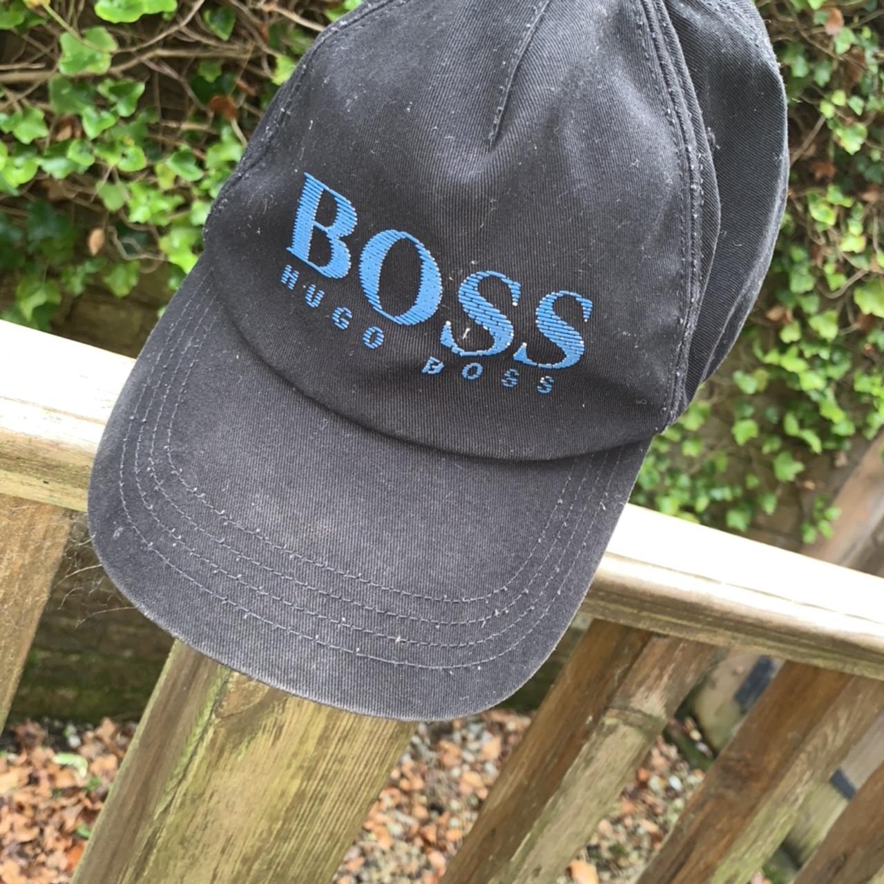 Black Hugo boss cap with dark blue logo, 8/10