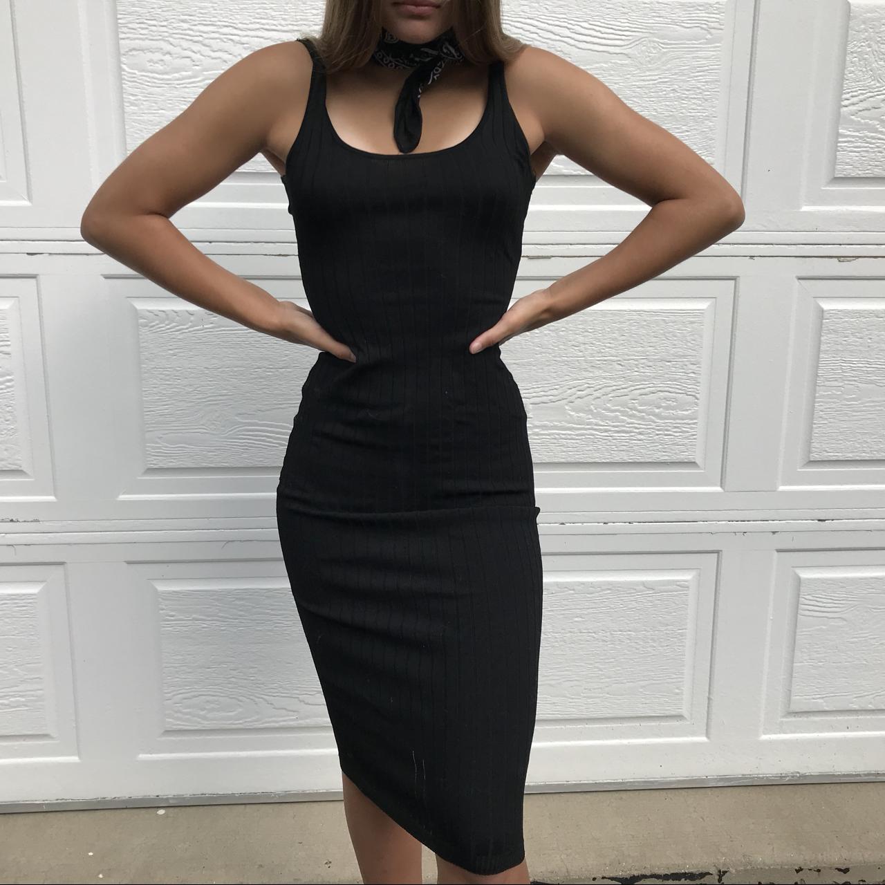 Black tight dress has one loose thread that has be - Depop