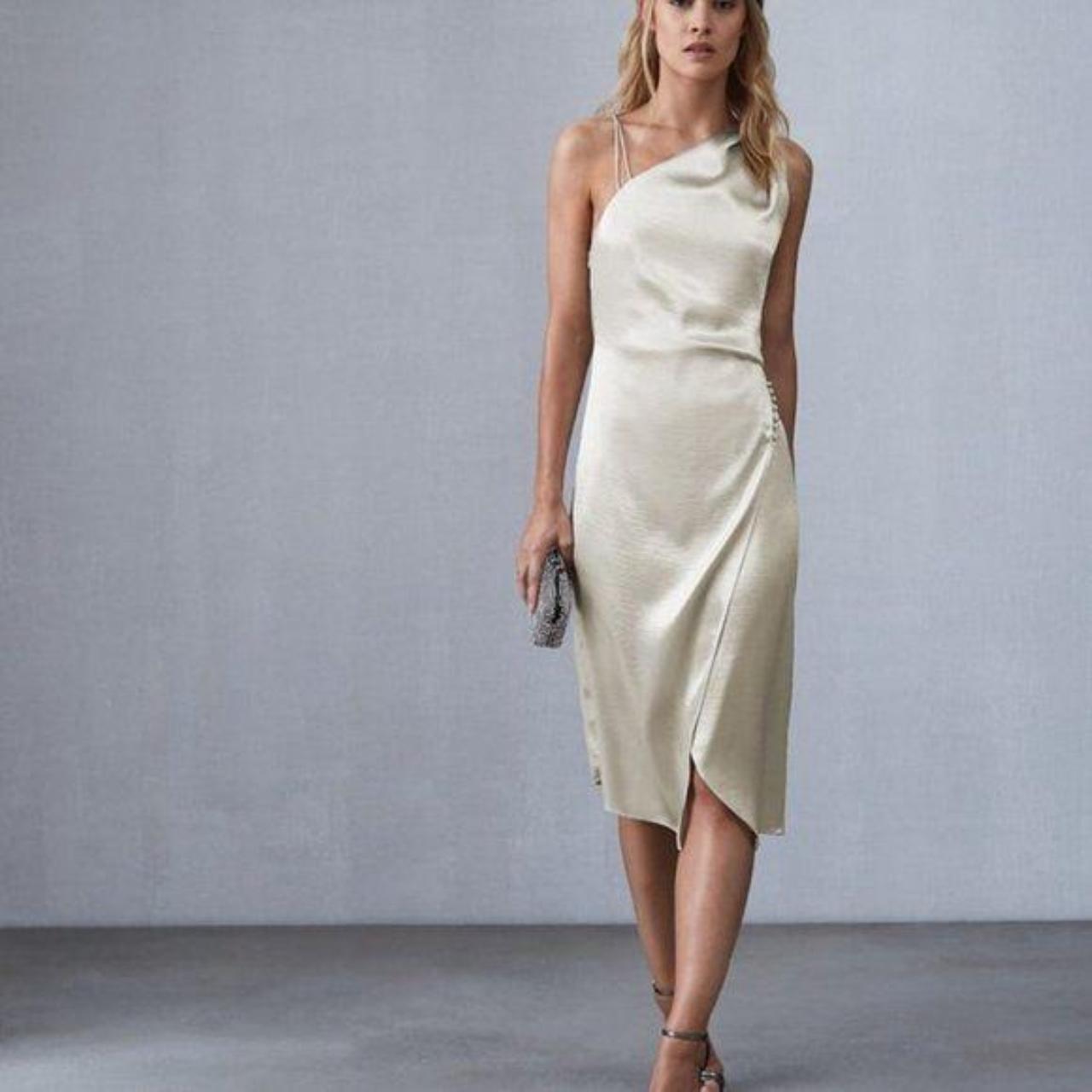 An elegant, playful piece from Reiss, the Depop