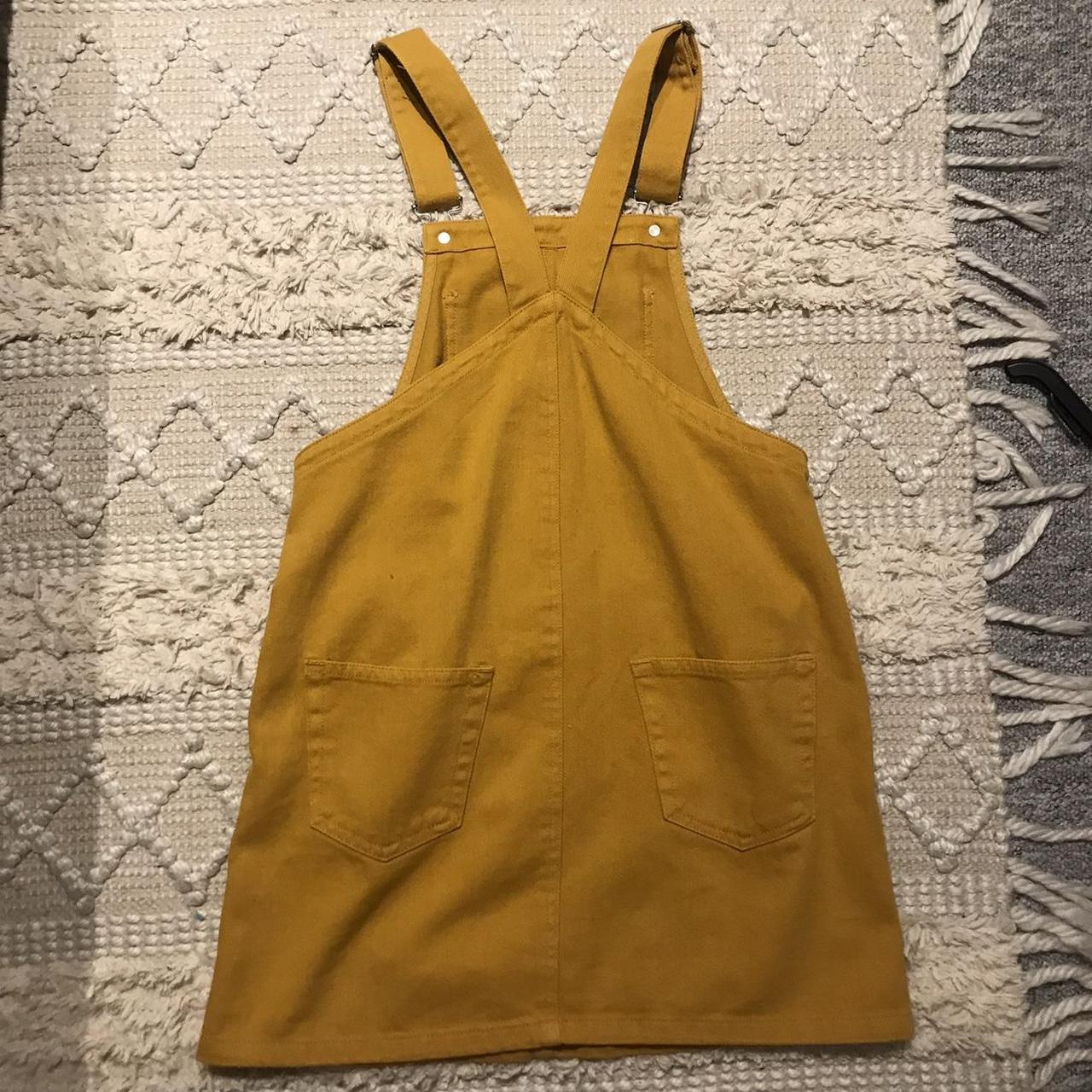 Mustard yellow denim pinafore/dungaree dress Worn a... Depop