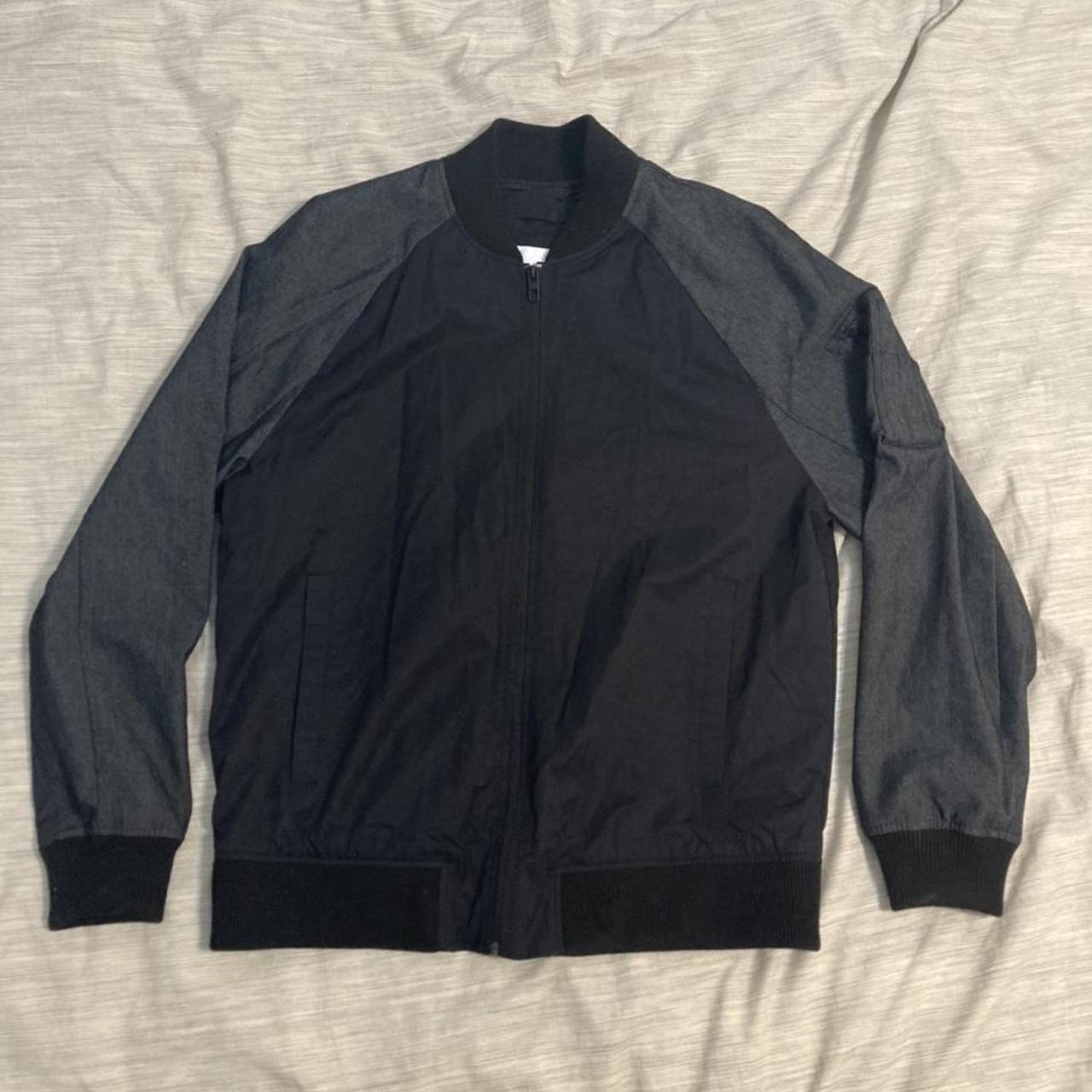 Black Calvin Klein bomber jacket with unique arm... - Depop