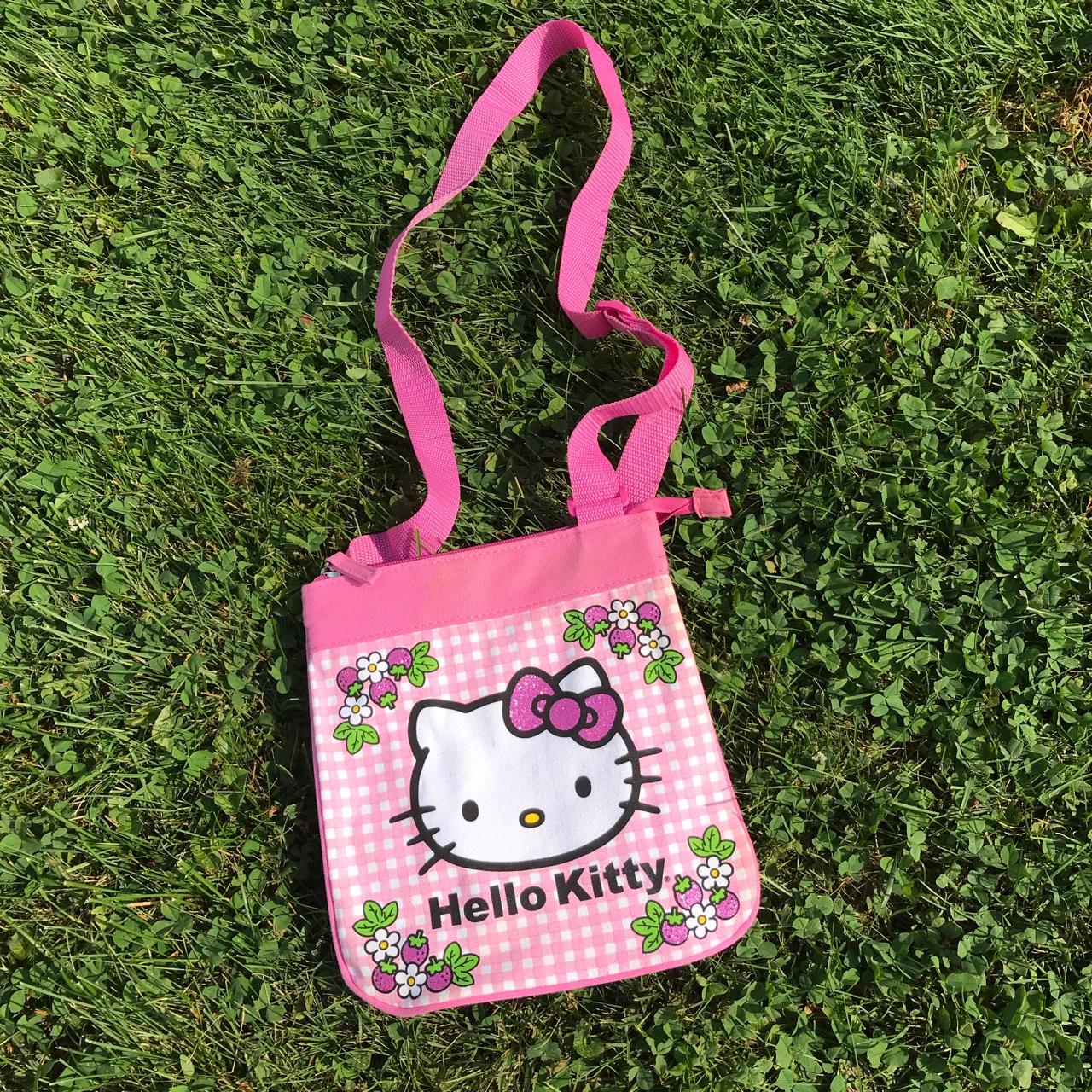 Adorable Hello Kitty bag with adjustable strap and a... Depop
