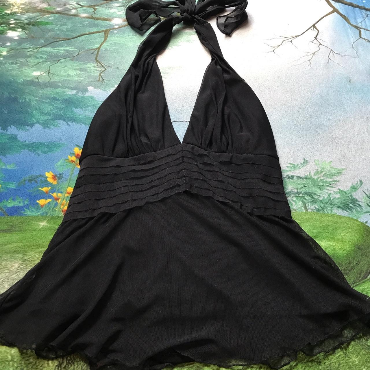 Vintage black halter top. Adjustable tie behind the... - Depop