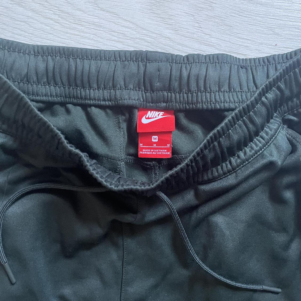 Nike Green Track Bottoms. Size M. Good Condition!... - Depop