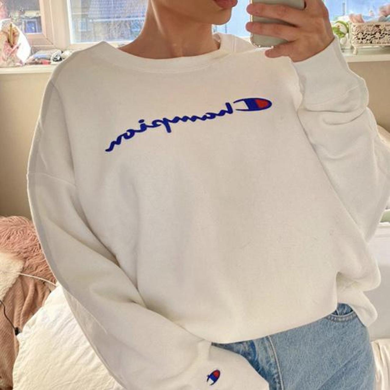 White champion jumper that’s been worn but still has... - Depop