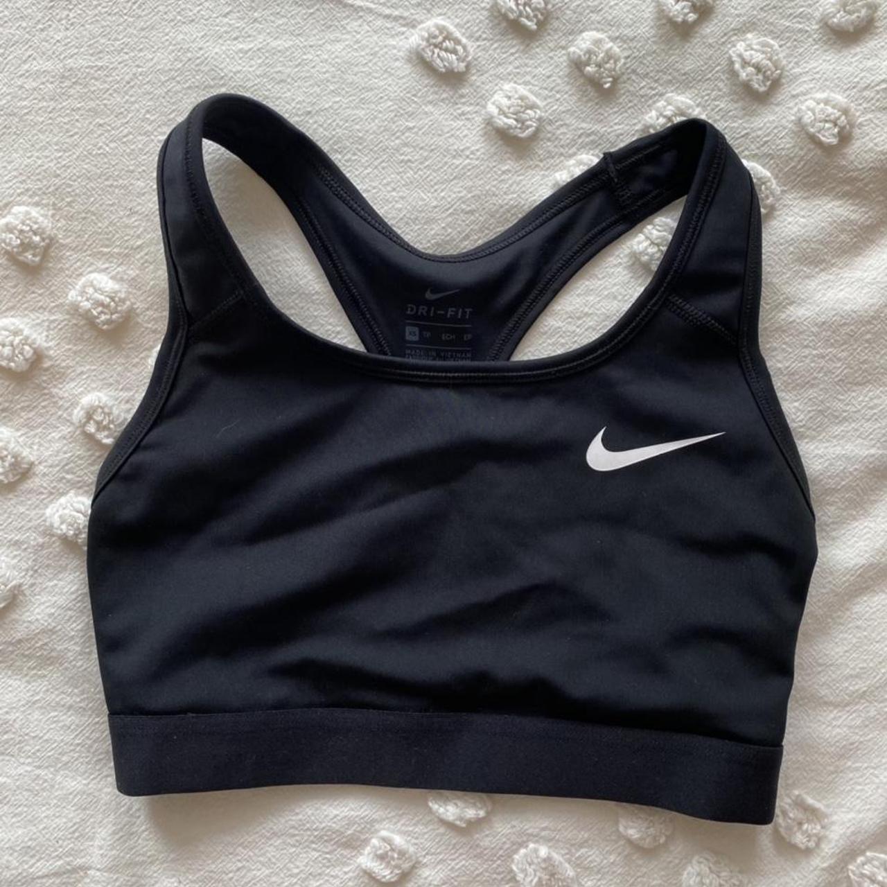 Nike sports bra. No pads, super stretchy, very... Depop