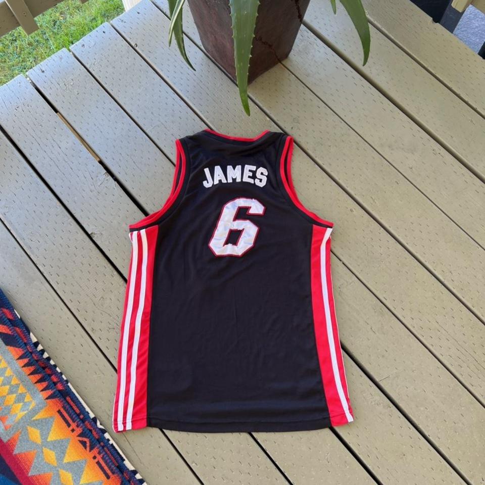 Miami Heat Lebron James jersey. Size Youth Large - Depop