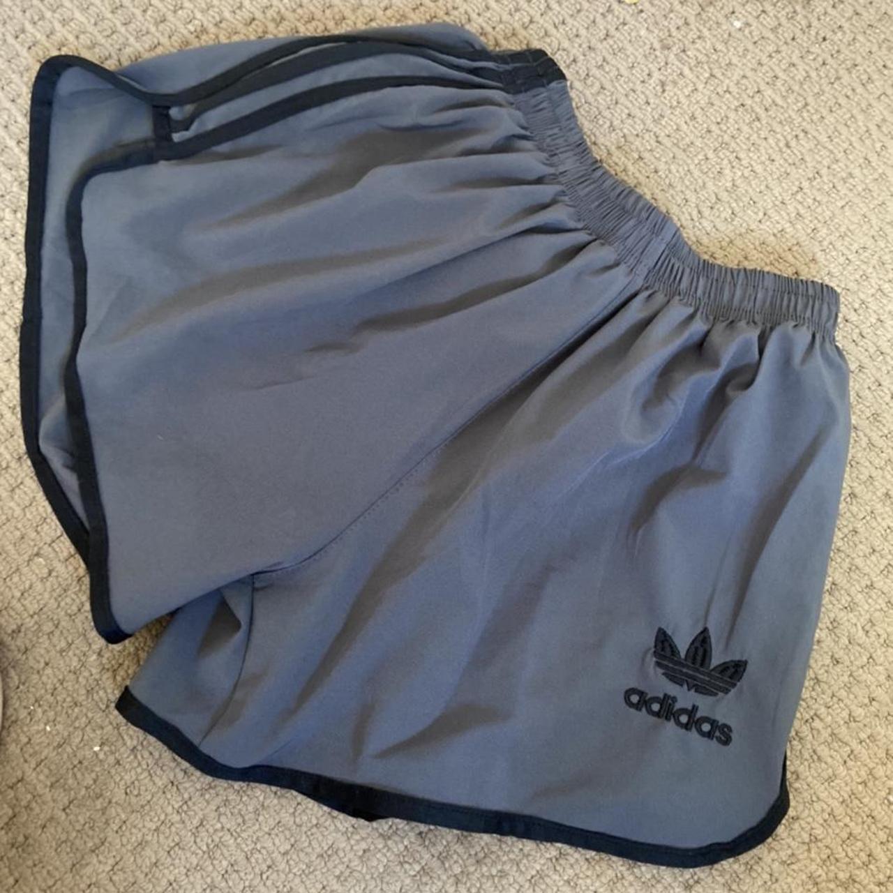 Adidas grey shorts with three stripes $10 size 6-8 - Depop