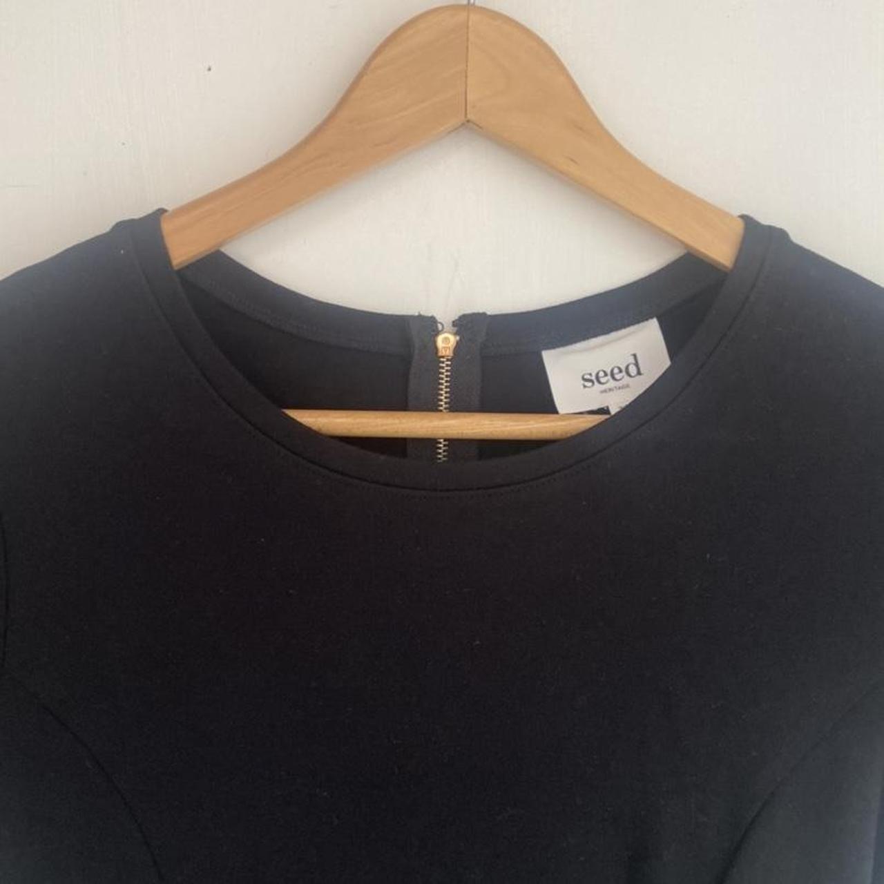 Seed black top in perfect condition. Size is an xs... - Depop