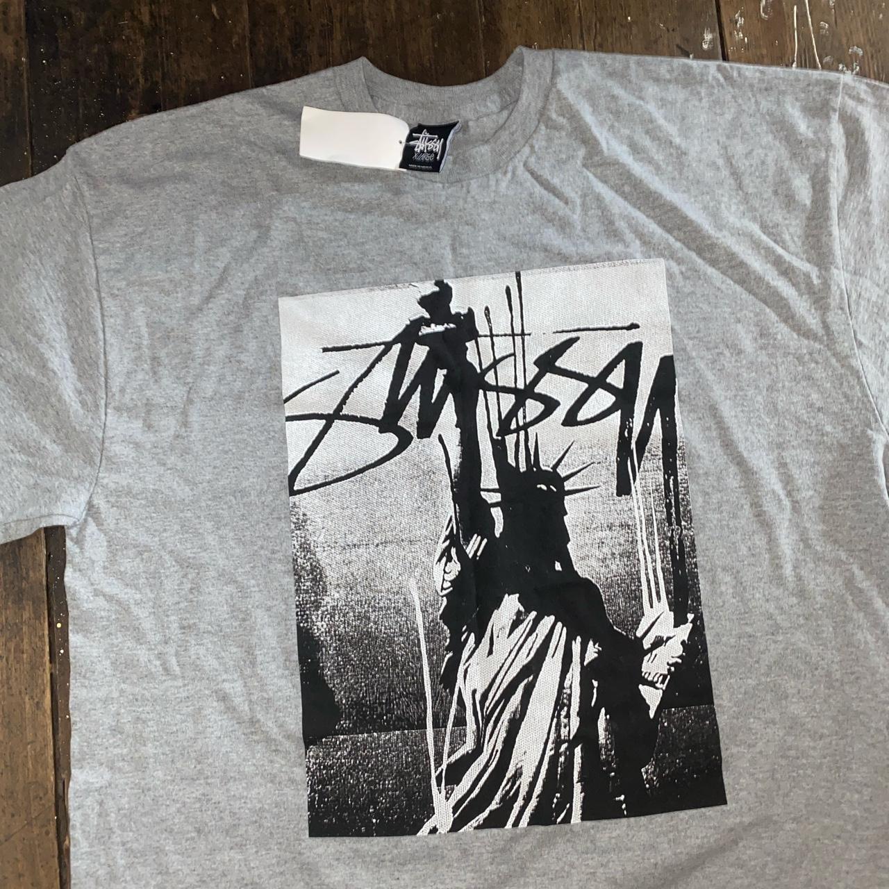 statue tee stussy