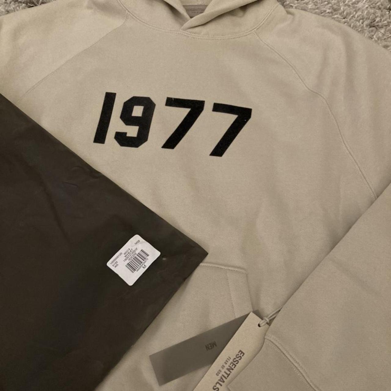 Fear Of God Essentials, '1977' Hoodie, Available In - Depop