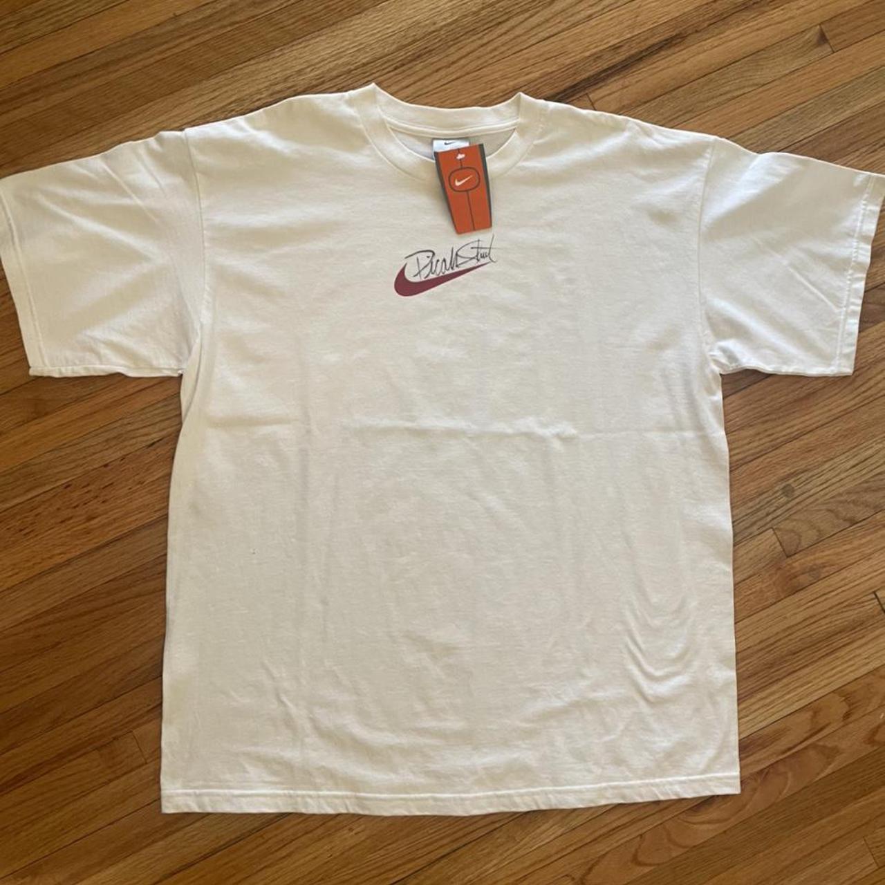 Vintage Nike Swoosh T-Shirt with unknown signature... - Depop