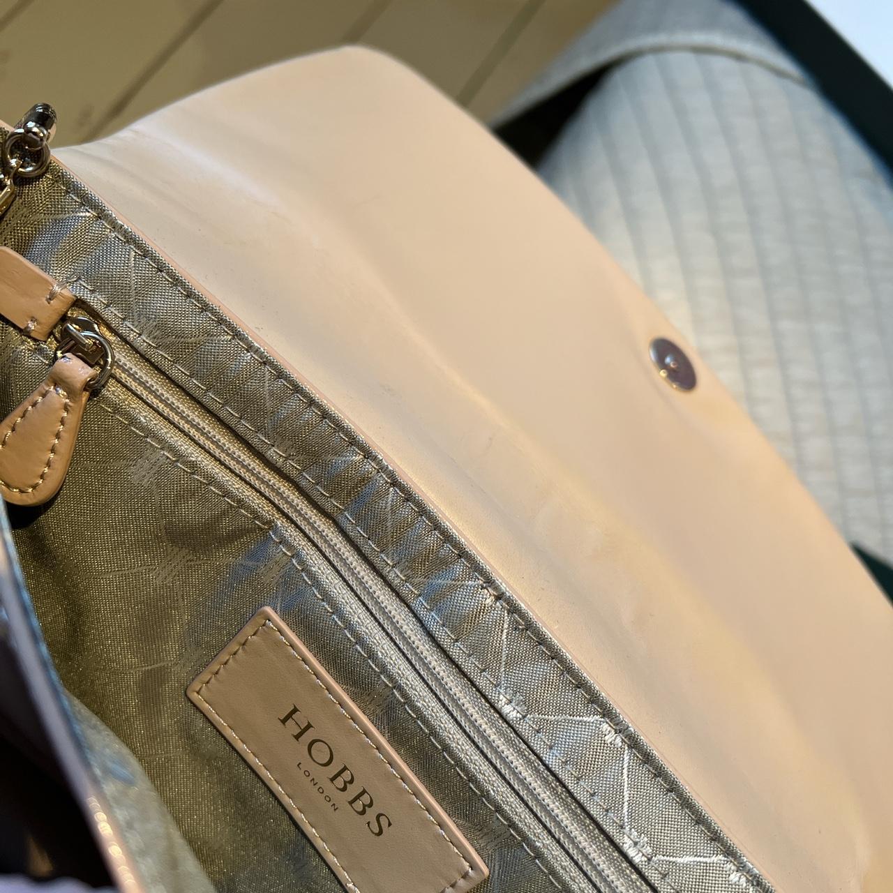 Hobbs leather patent clutch bag in light nude -... - Depop