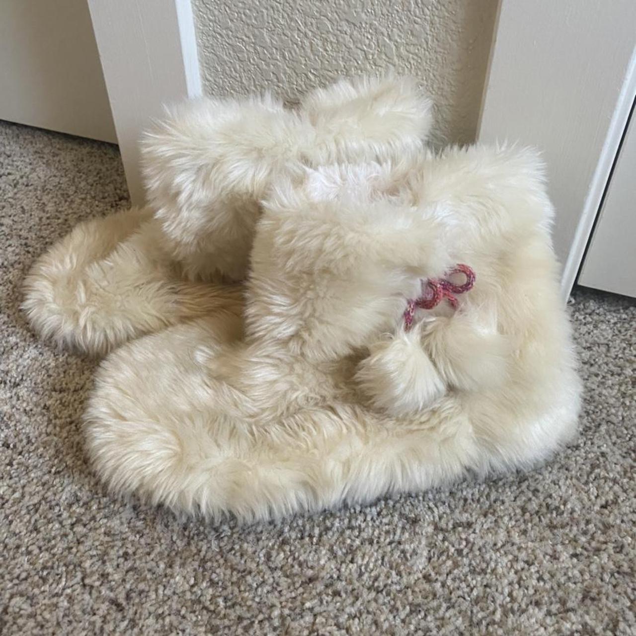 cream colored fur boots