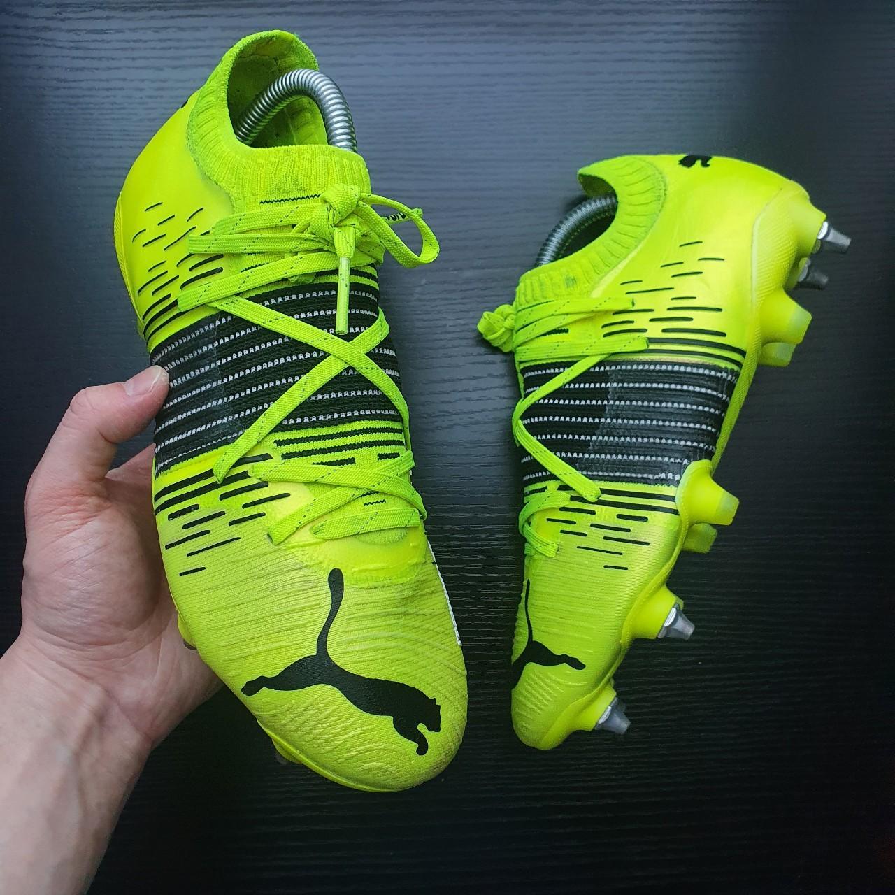 puma smiley face cleats