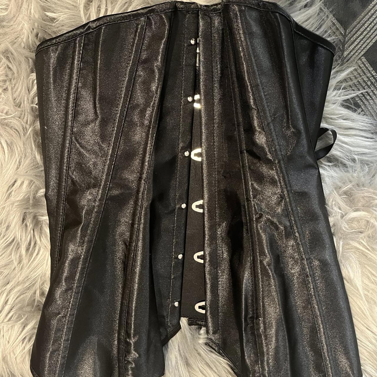 Black satin corset in size XS. Never worn.... - Depop