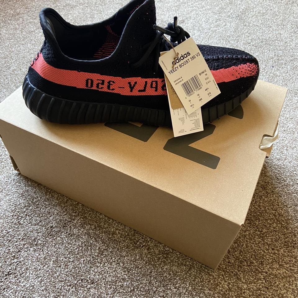 Fake yeezy red on sale stripe