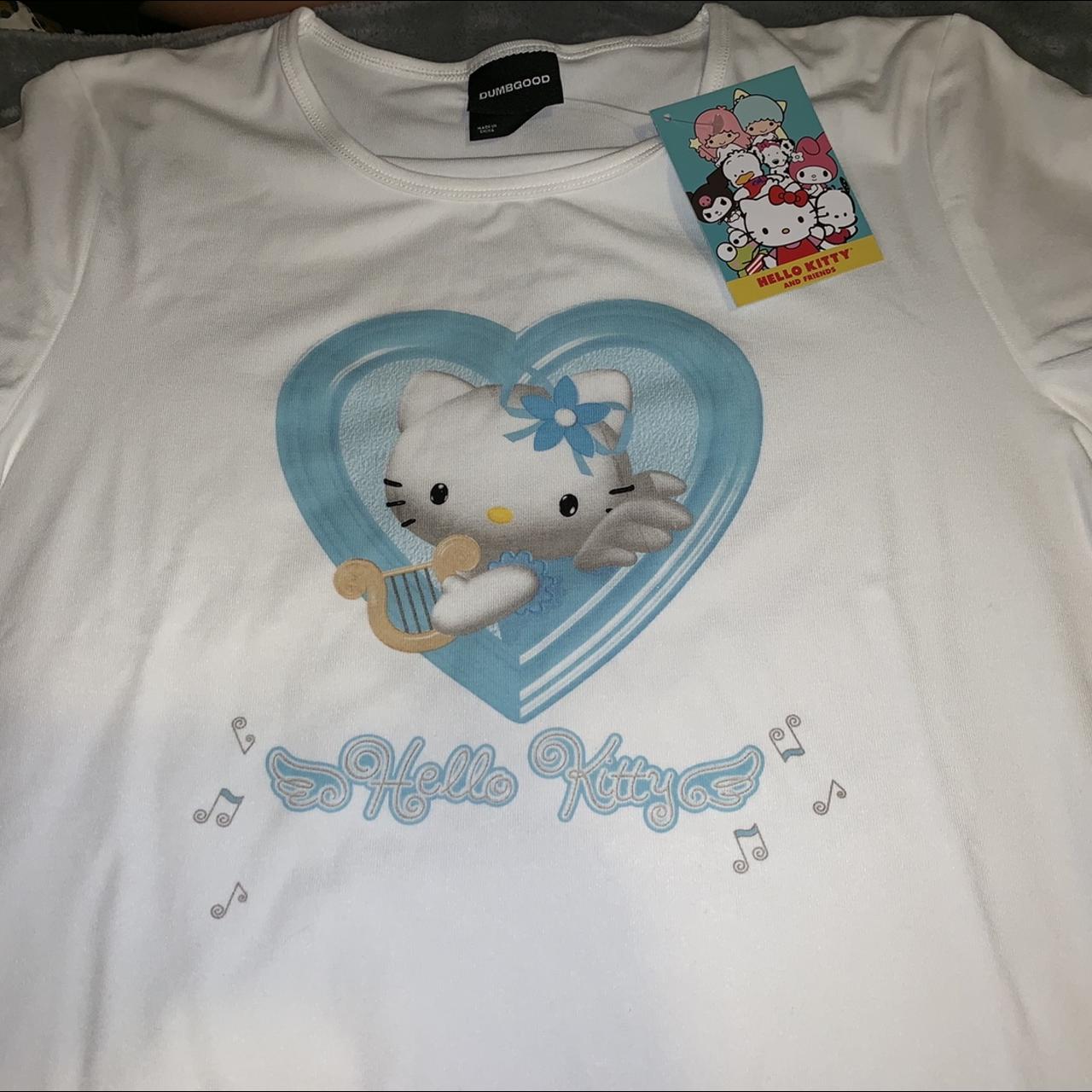 white Hello Kitty design t-shirt with four tiny - Depop