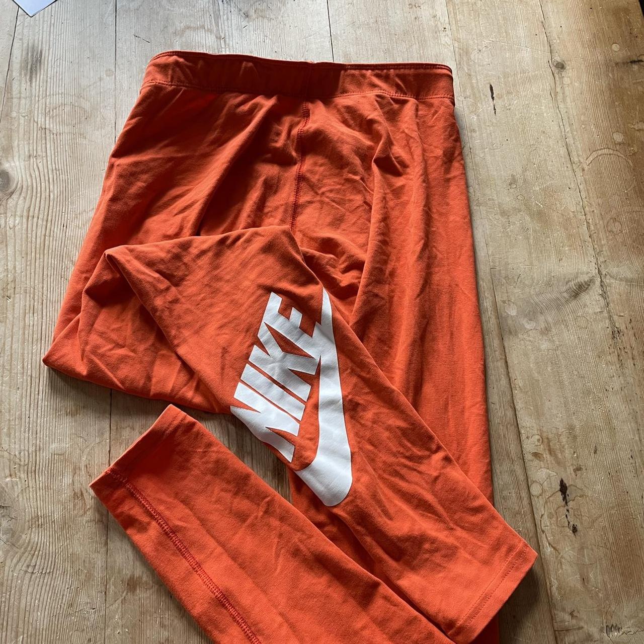orange leggings nike