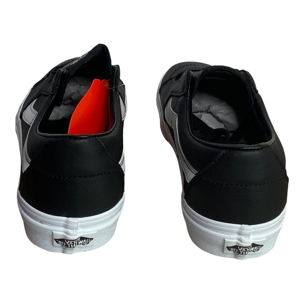 Vans black leather on sale sneakers