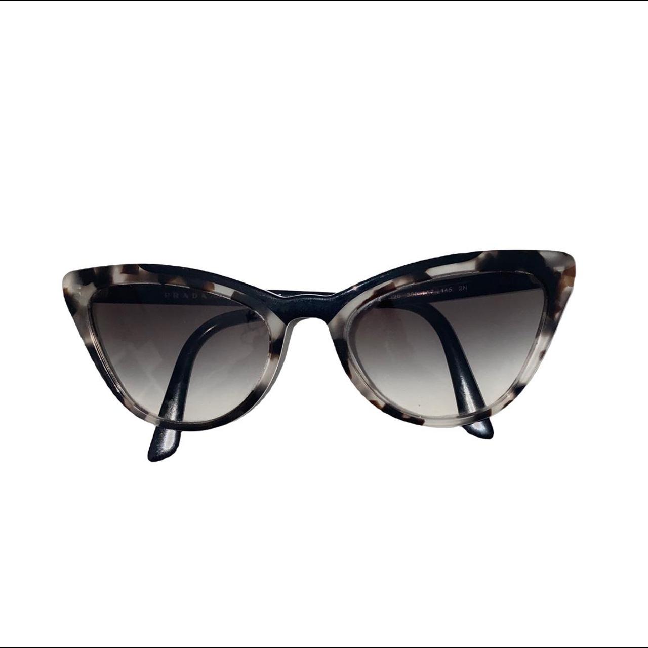 Prada ultravox hotsell cat eye sunglasses