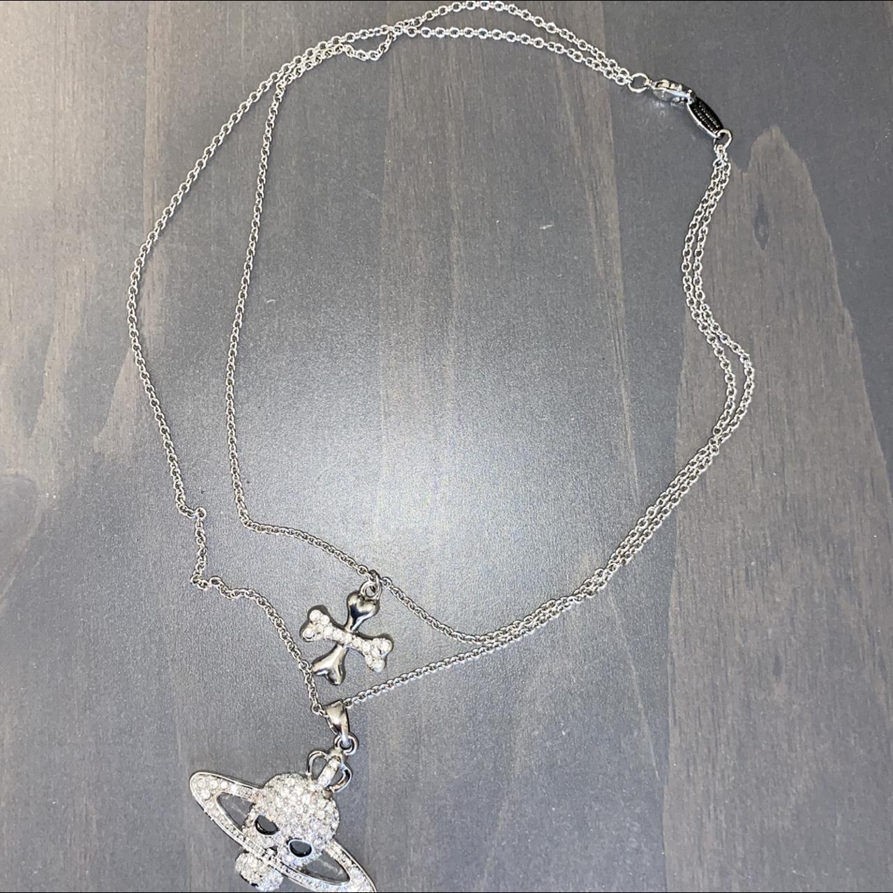 Vivienne westwood skull sale and crossbones necklace