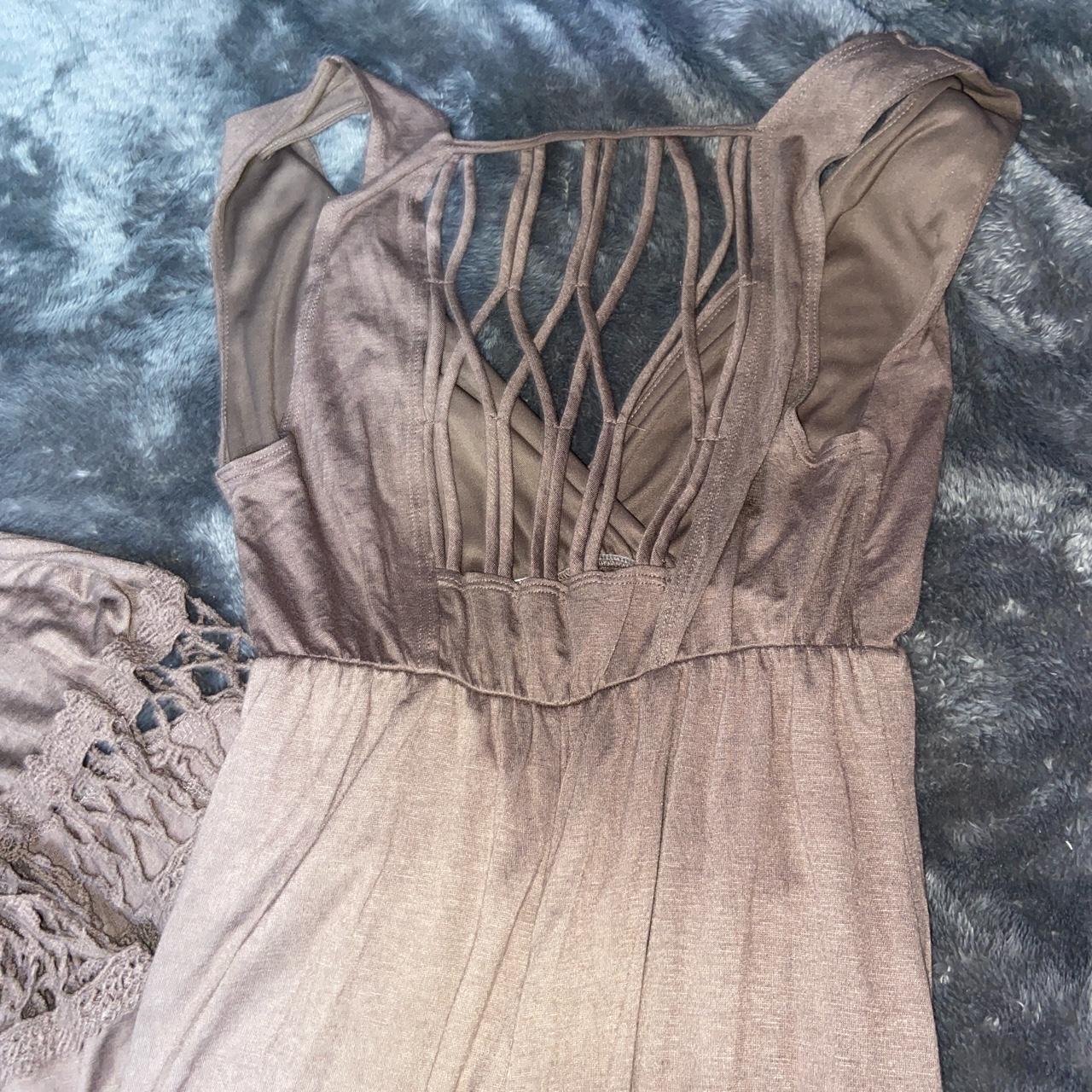 Long brown dress. Features a cut out design... Depop