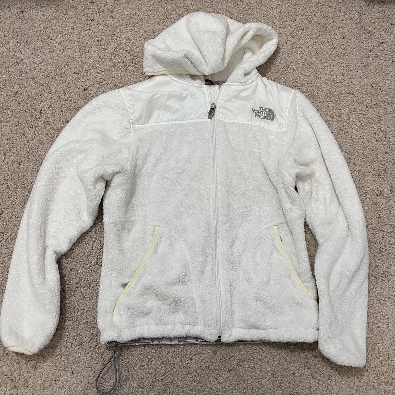 white fluffy north face jacket