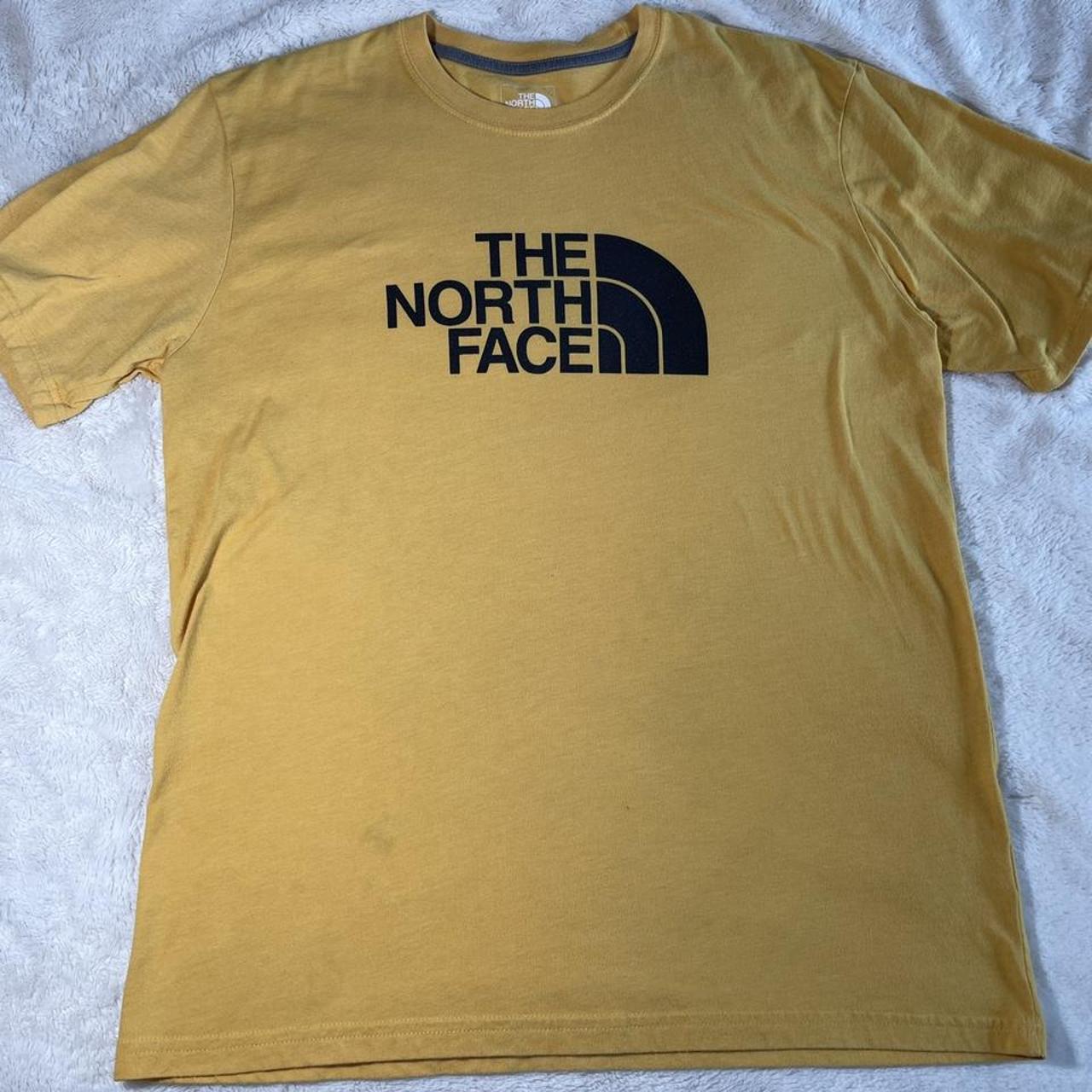 The north face t shirt. Very nice yellow color and... - Depop
