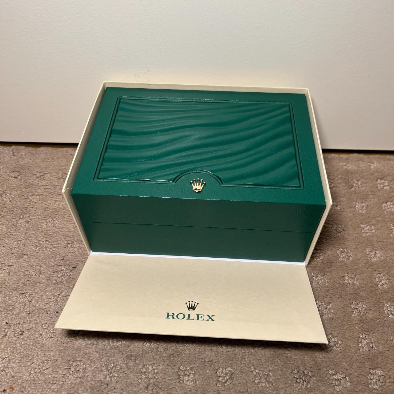 Rolex Men's Green and Gold Watch