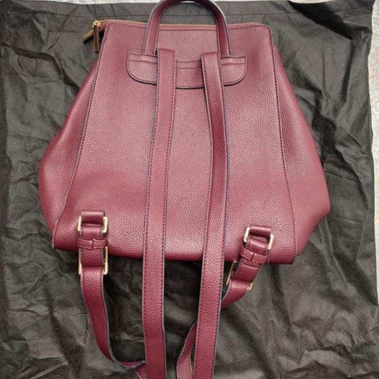 Burgundy dune backpack with small purse, has been... Depop