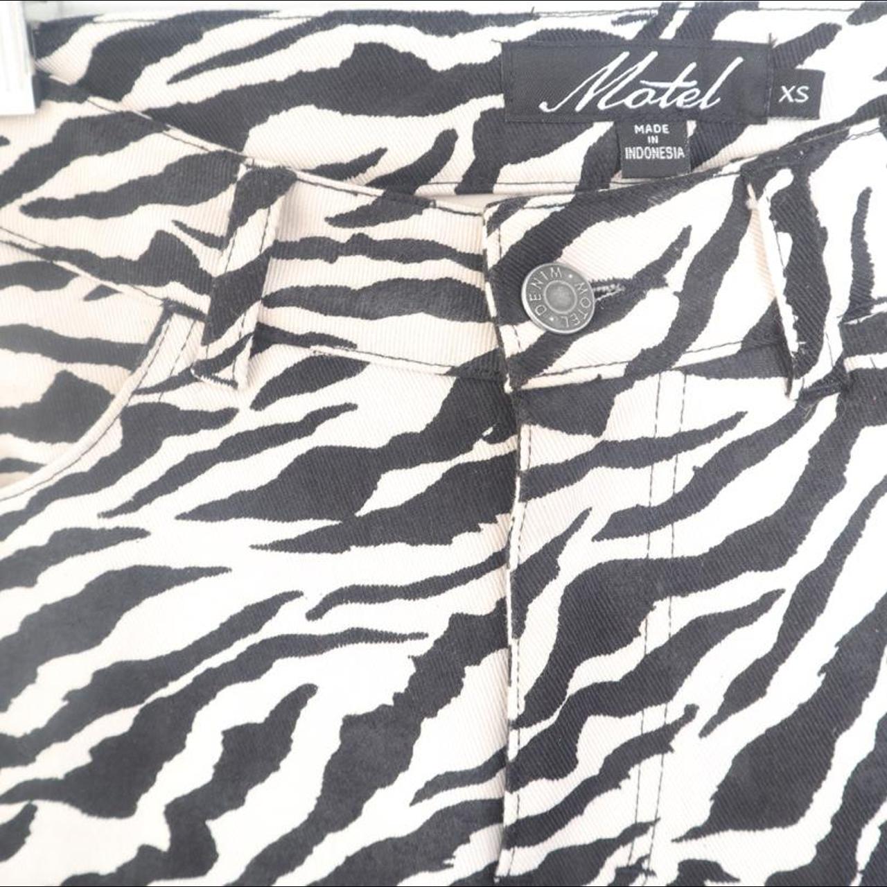 Motel Women's White and Black Jeans Depop