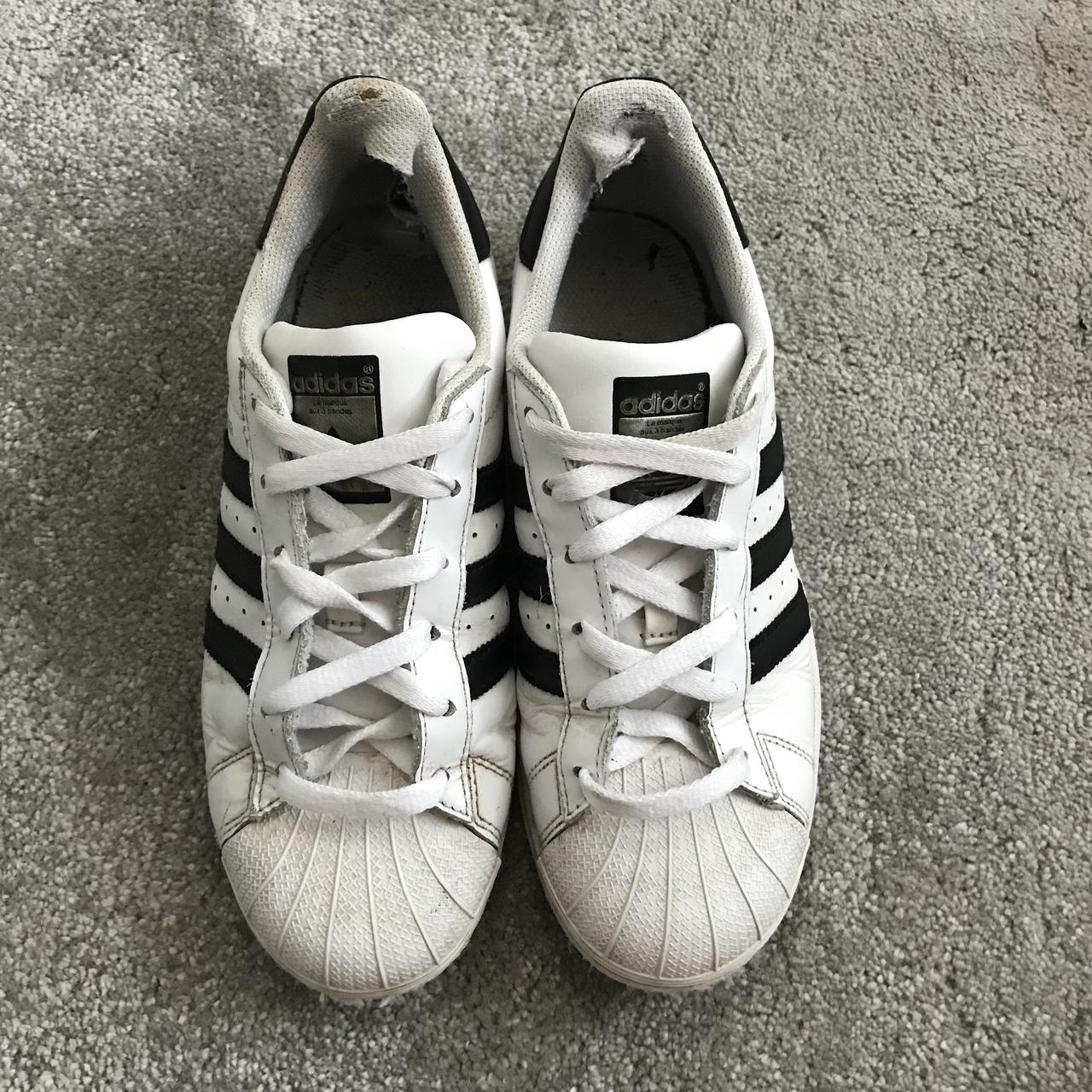 ADIDAS SUPERSTAR BLACK AND WHITE size 5. worn loads,... - Depop