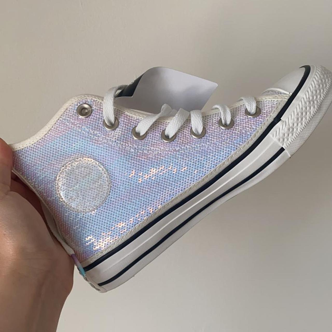 Silver sequin clearance high top converse