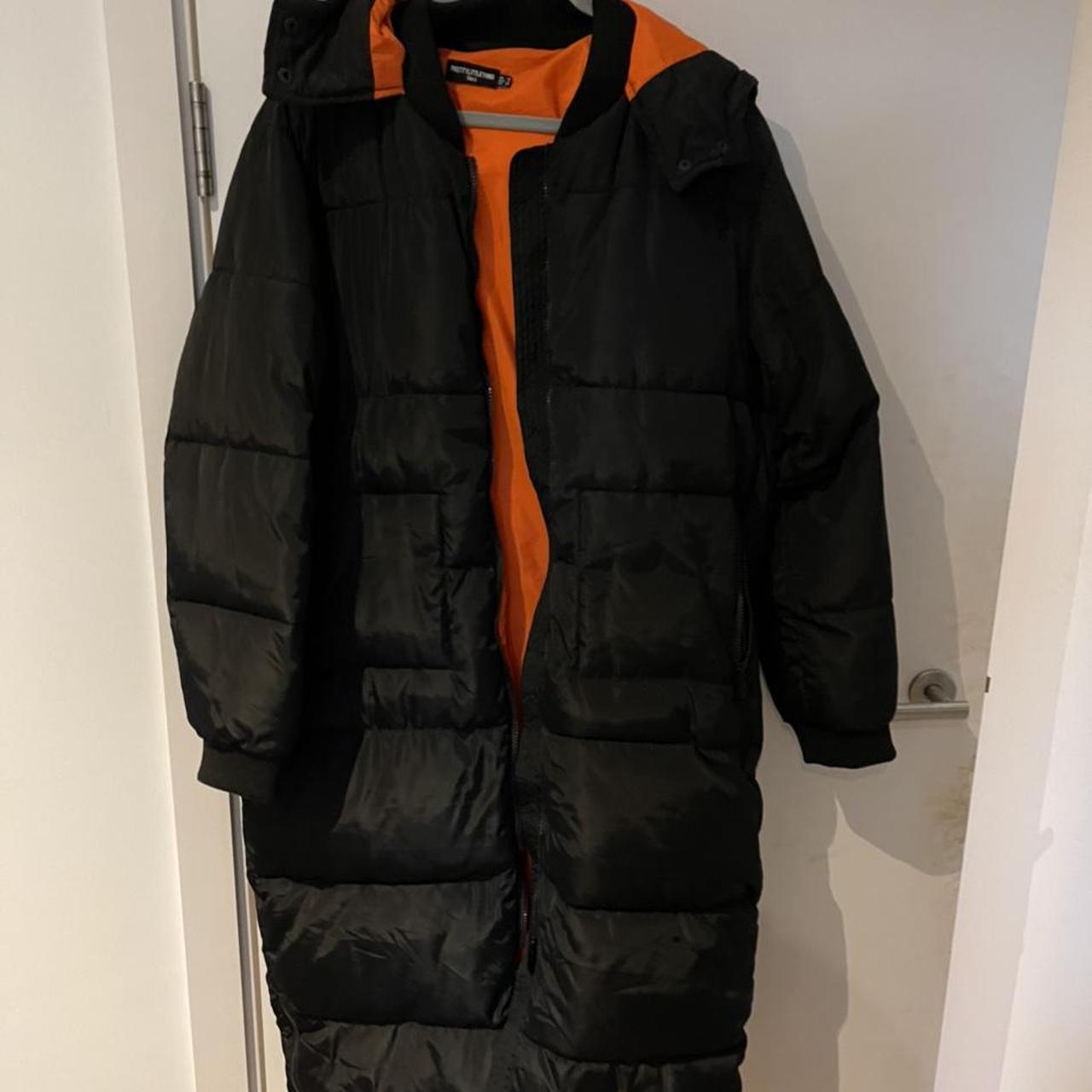 black puffer jacket orange inside