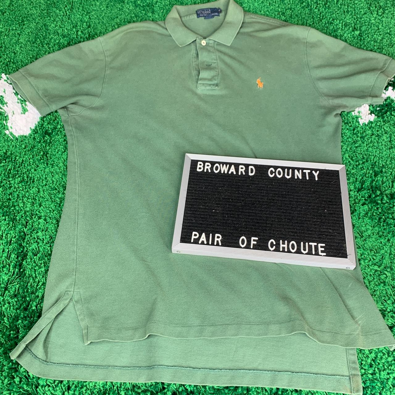 Green polo shirt with orange horse hotsell