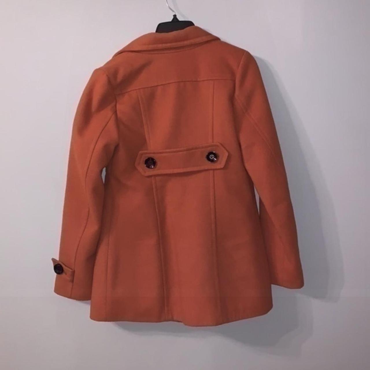 Burnt orange trench coat size European 40 small... Depop
