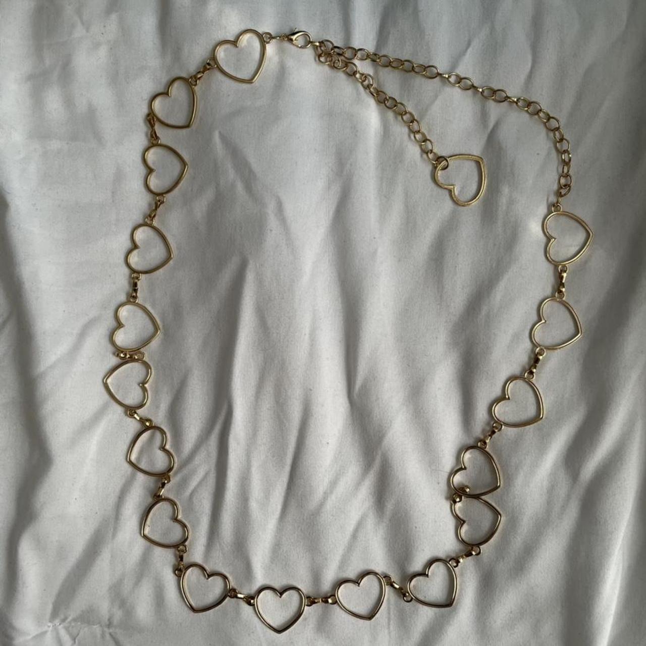 Super cute gold heart chain belt 🧡 Originally got it... Depop