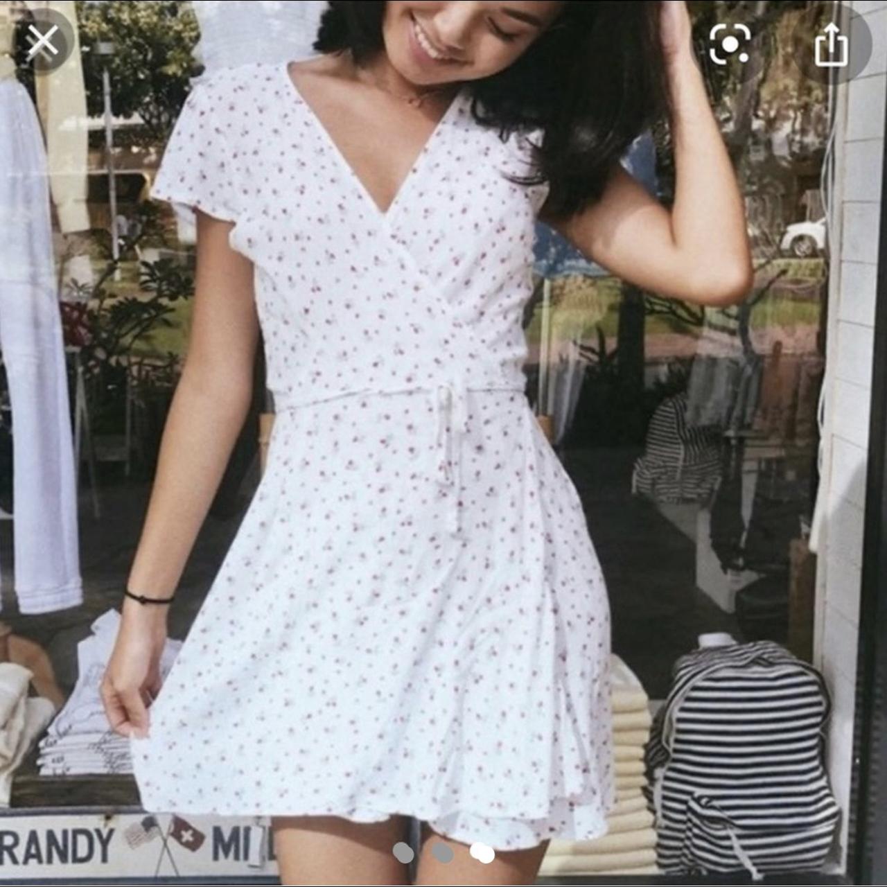 Brandy Melville white floral dress. Super rare as... Depop