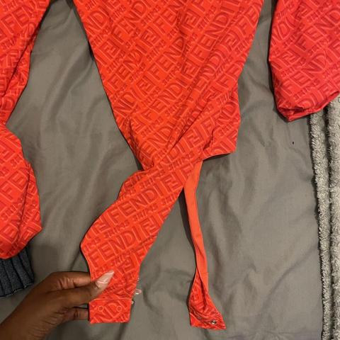 FENDI x SKIMS ORANGE BODY SUIT MEDIUM.