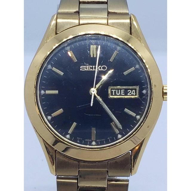 Seiko Men's Gold-Tone Day/Date 7n43-9070 Black Dial... - Depop