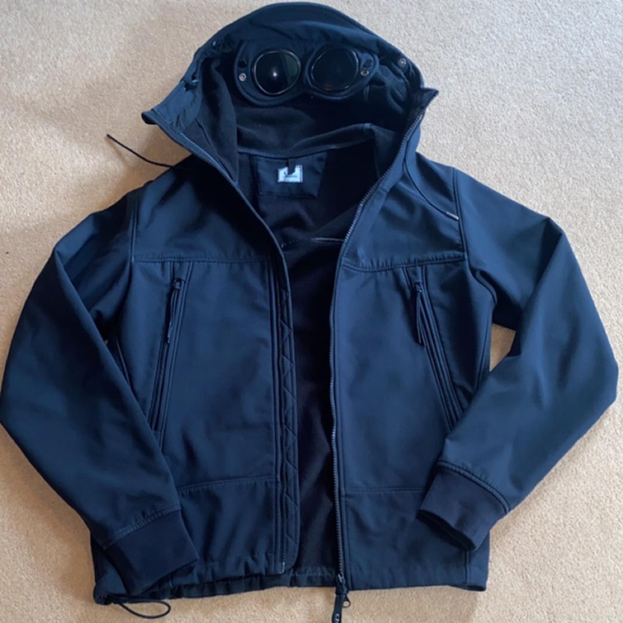 Black CP soft shell jacket. Overall good condition... - Depop