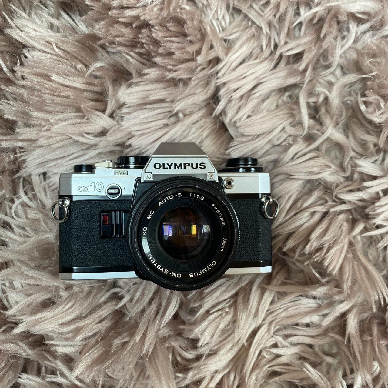 Olympus OM10 Vintage SLR 35mm Film Camera with f/1.8... Depop